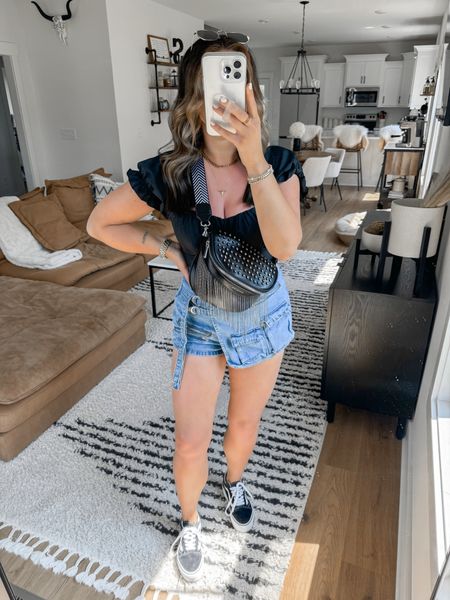 This denim cargo skort is giving me allll the edgy vibes 🖤 I love how you can dress it down more casually for errands or could also style it up for date night! I got my normal size small & I have plenty of room in the waist! I wouldn’t recommend sizing down though because I’m afraid it would be slightly too short in the back if I did 👏🏼

Top — medium
Skort — small

casual outfit | running errands outfit | brunch outfit | edgy outfit | edgy style | edgy vibes | platform vans sneakers | denim skort outfit | cargo mini skort | rhinestone fringe belt bag | outfit ideas | summer outfit | summer outfits | summer style inspo | summer outfit ideas 

#LTKItBag #LTKShoeCrush #LTKFindsUnder50