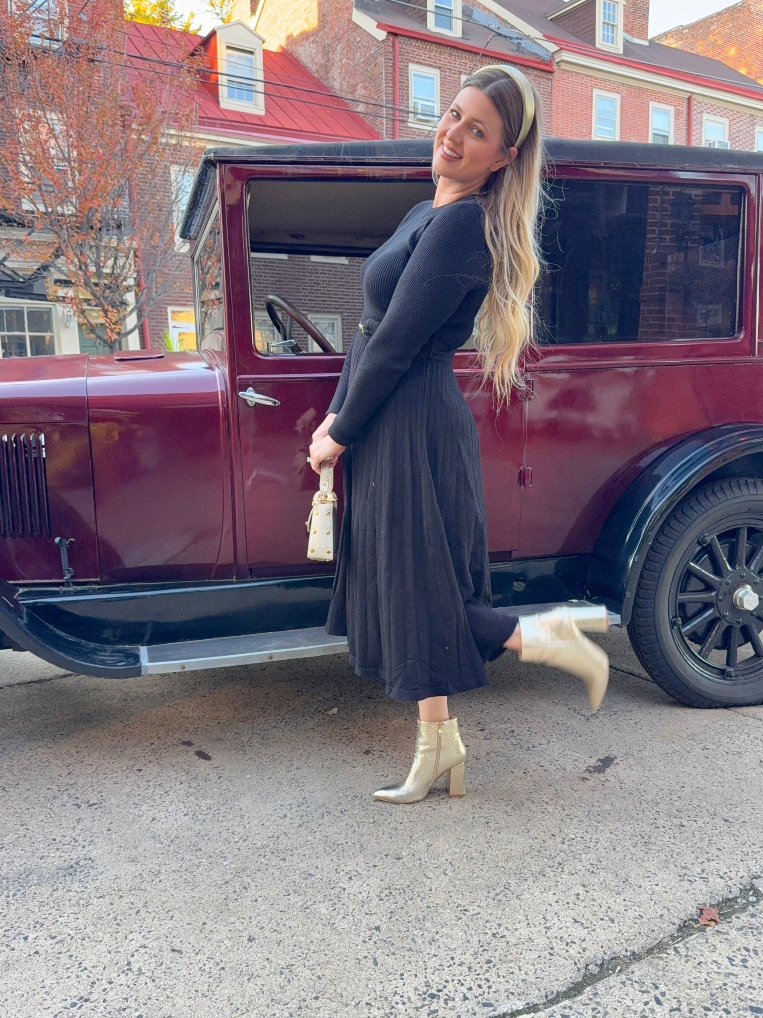 Classic little black sweater dress and gold accessories. The quality of this dress and handbag is so luxe. 

#LTKFindsUnder50 #LTKHoliday #LTKStyleTip