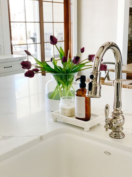 Spring kitchen sink styling, marble tray, amber soap dispenser 

#LTKhome #LTKFind #LTKSeasonal