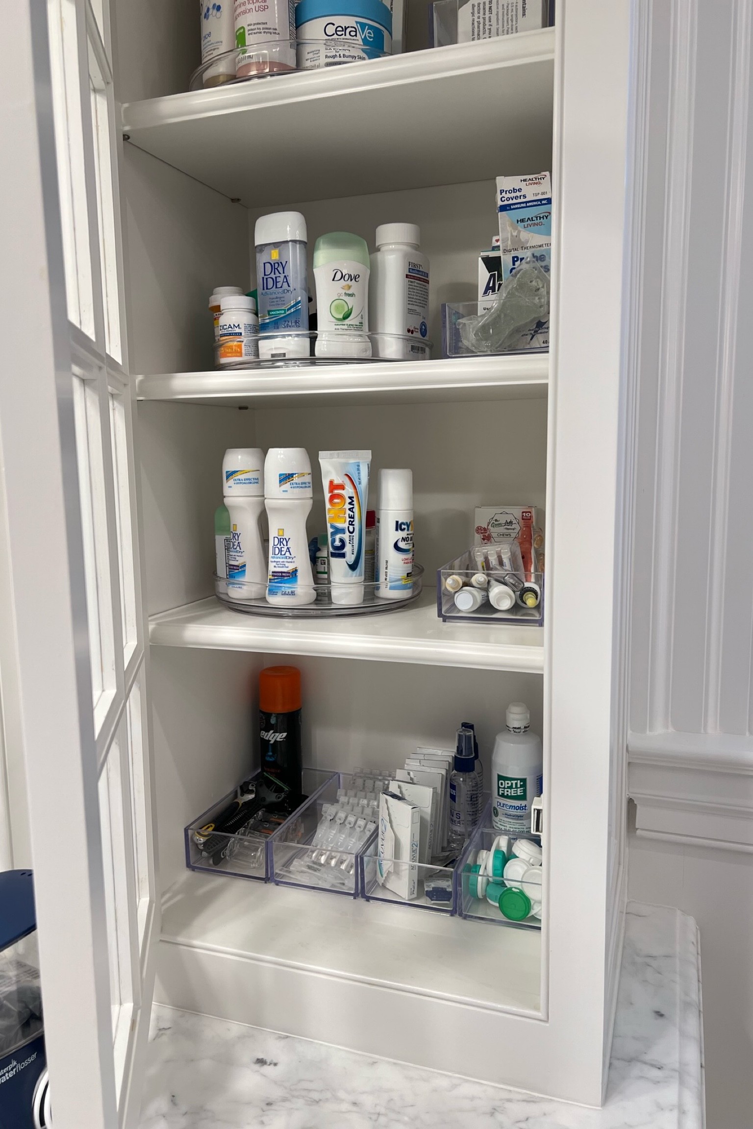 Coming in a variety of sizes, these Idesign acrylic trays are a great sleek way to contain medicine cabinet necessities and toiletries. We also added acrylic lazy susans to make it easy to view, reach and grab what you need.

#LTKfamily #LTKmens #LTKhome