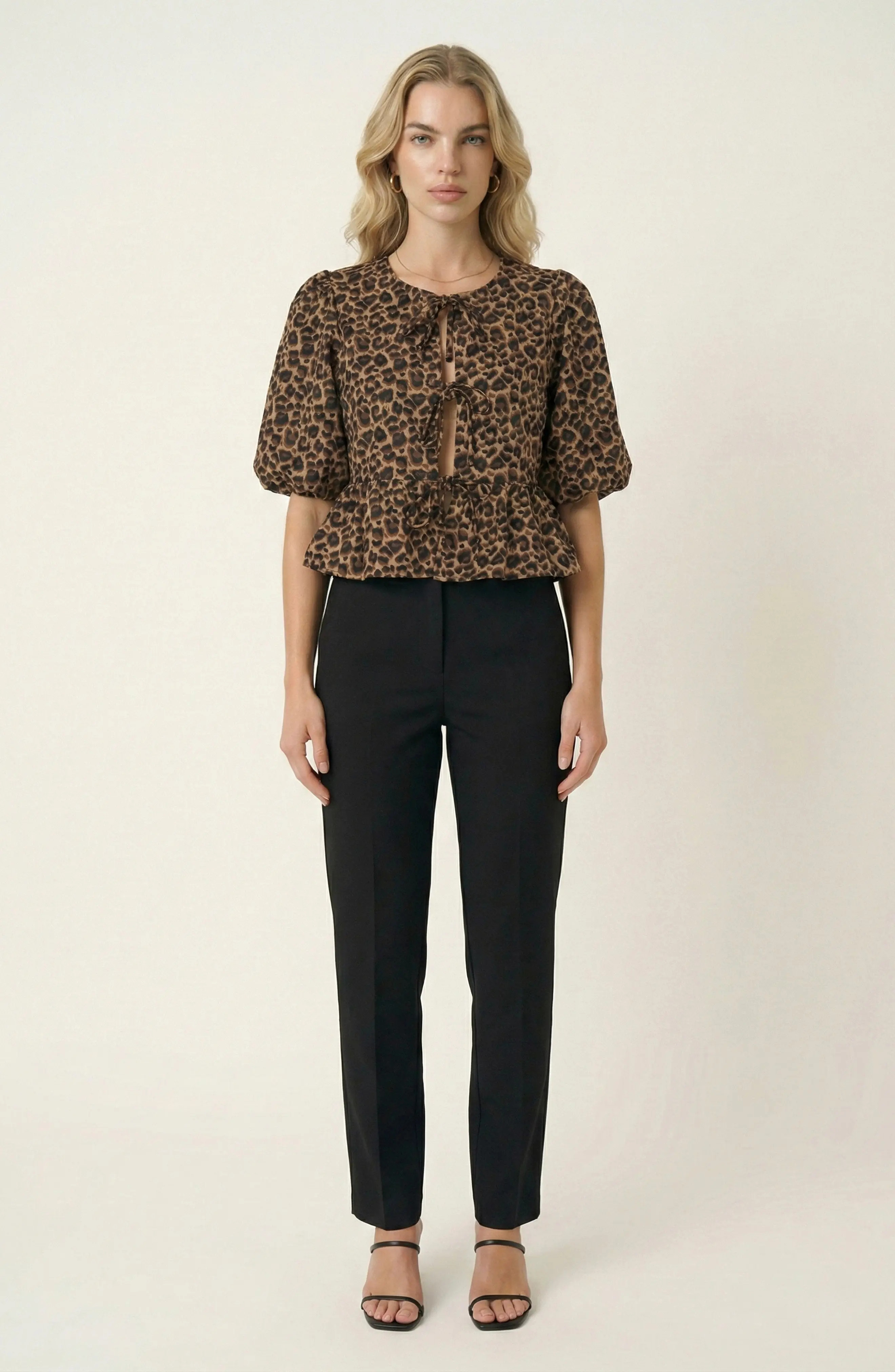 Modenaire Peplum Top with Front Tie Closures and Short Puff Sleeves in Leopard Print at Nordstrom, Size Large | Nordstrom