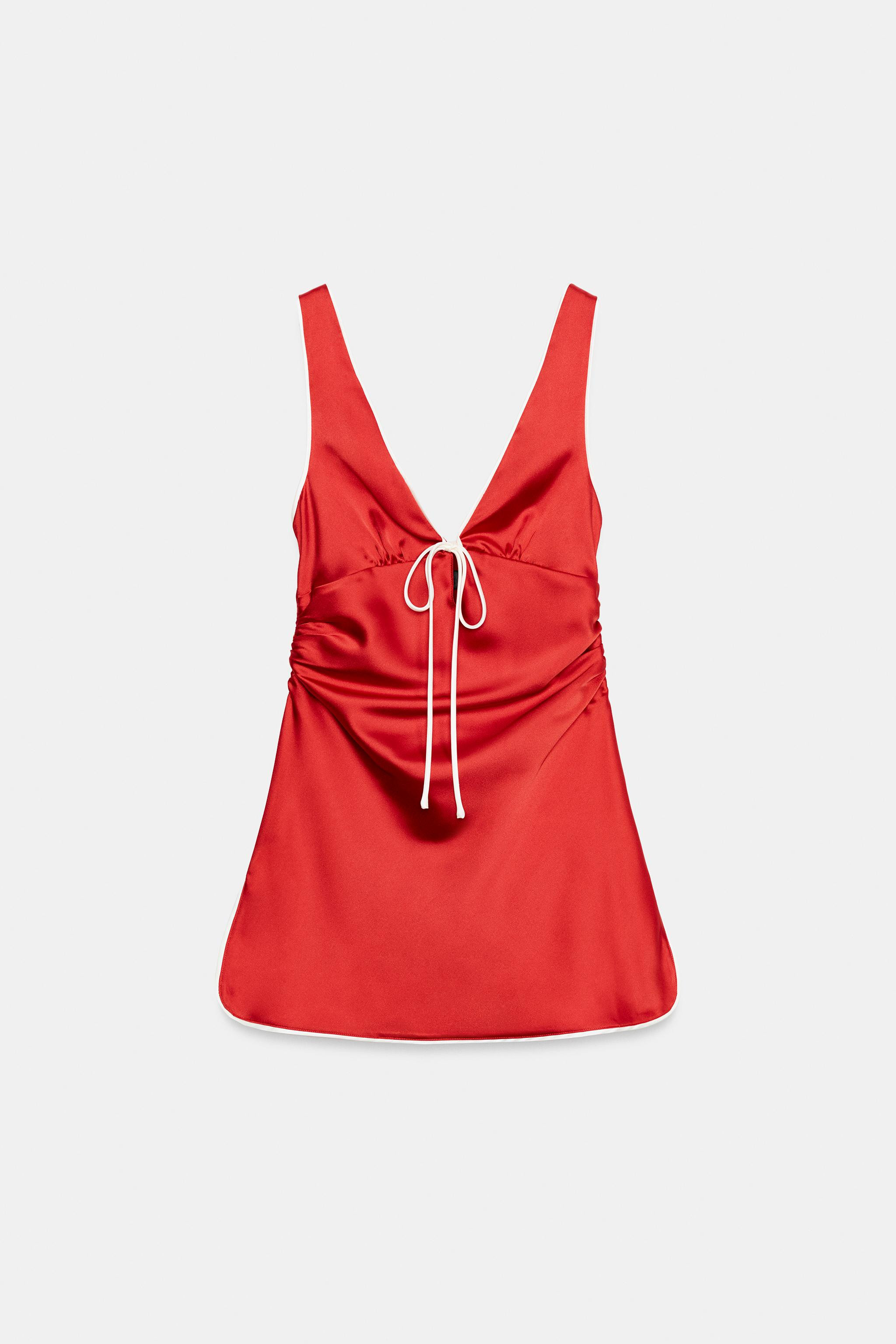 V-neck dress with opening and tie detail. Wide straps. Contrast piping and side ruching. Hem with... | Zara US