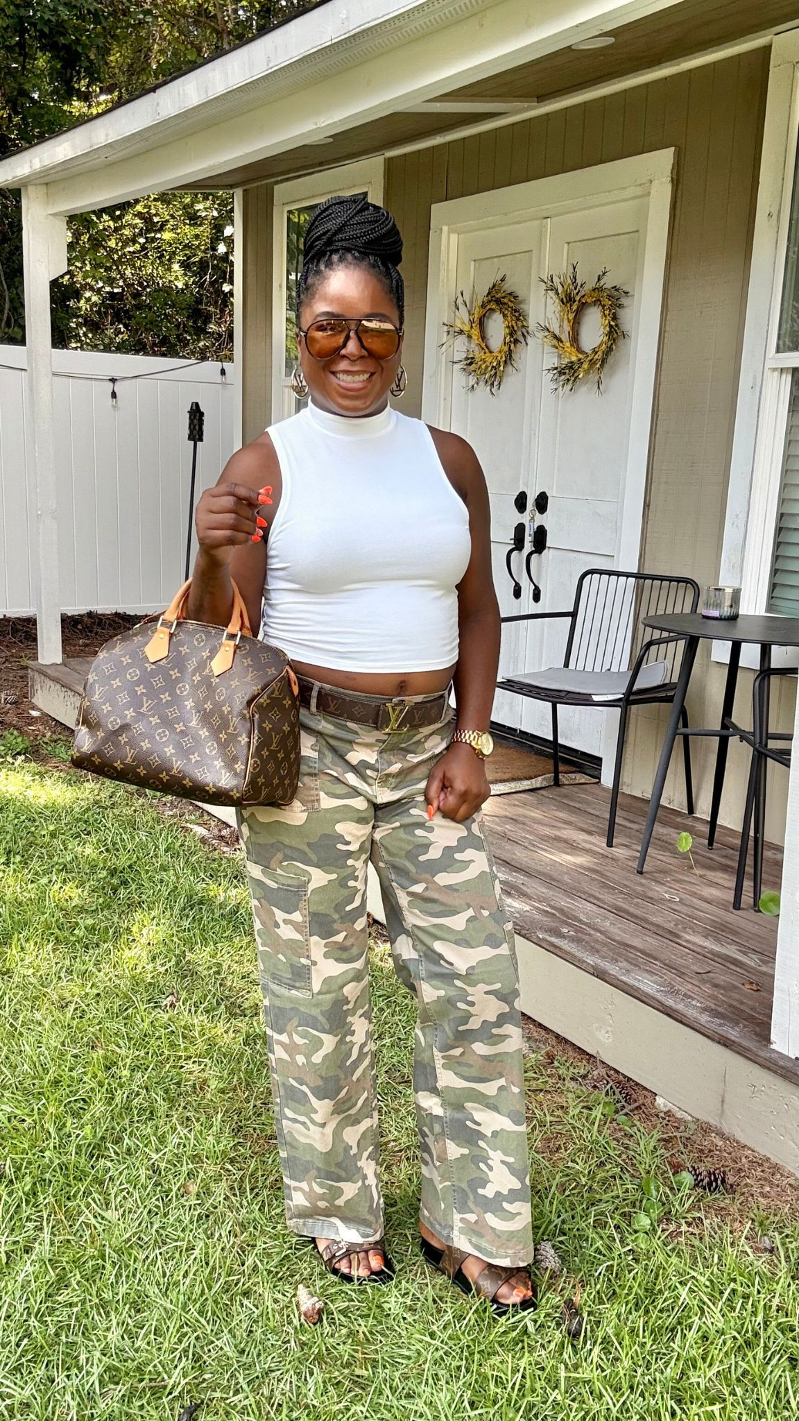 Sometimes a simple bag change really changes the style of camo cargo pants. I styled this casual outfit with a white crop top, Adidas Sumbra sneakers, LV accessories and my LV Speedy bag. 

 #LTKActive #LTKSaleAlert #LTKStyleTip