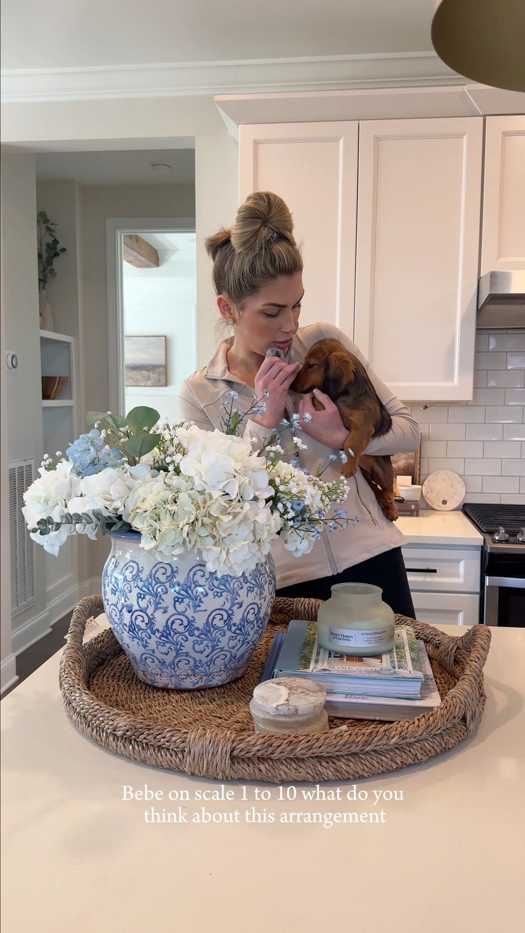 A little styling moment 🤍✨
Keeping it fresh and elevated with a large faux floral arrangement in a classic blue & white vase 💙 Paired with a woven tray, stacked blue books, a candle, and coasters for that perfectly layered look 🙌
Simple pieces, styled together = effortless, everyday beauty 🕯️🌸🛋️ 

 #LTKdayinmylife #LTKU #LTKHome