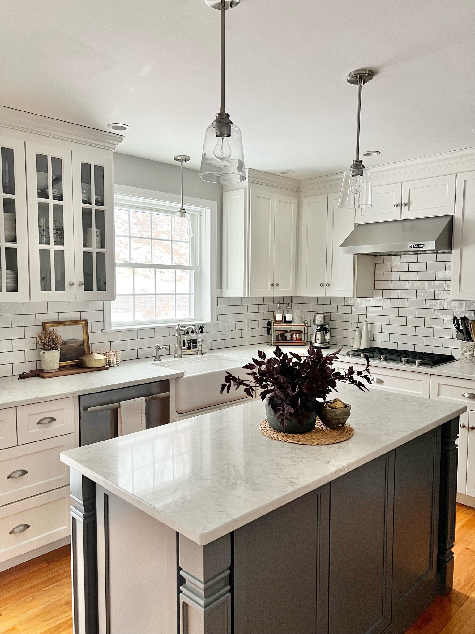 Kitchen decor, pendant lighting, farmhouse sink, coffee bar, latte mugs, coffee syrups, espresso machine, vases, florals, gold home decor accents, artwork, kitchen island, countertops 

#LTKhome