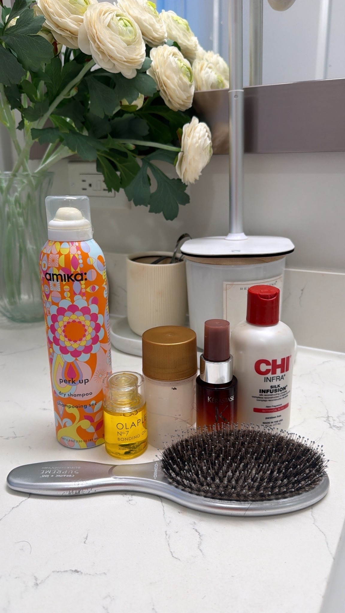 Some of my hair extension essentials 🤏🏾

Chi Silk Infusion - light weight gel serum that I use on my natural hair or extensions sparingly/on occasion before heat

Kerastase Night Serum - This stuff is AMAZING, it’s new to my routine but I will put this on my hair and extensions overnight and it will just bring it back to life without weighing it down or being greasy.

Keracare Wax Stick - I use this on my edges before a hot comb or heat and it will press your hair out like a relaxer. Lasts forever, I’ve had mine for 2 years and we’re just coming close to the end 😭

Olaplex bonding oil - lightweight oil perfect for finishing styling or just adding shine back to your hair

Amika Perk Up Dry Shampoo - this might be the best dry shampoo in the game, there’s no white residue and it actually makes your hair feel like it was just washed, super soft and clean!

Olivia Arden Brush - I didn’t not realize how valuable a good brush was until I got this brush. Perfect for detangling and brushing out curls.

#LTKBeauty #LTKgrwm #LTKmorningroutine