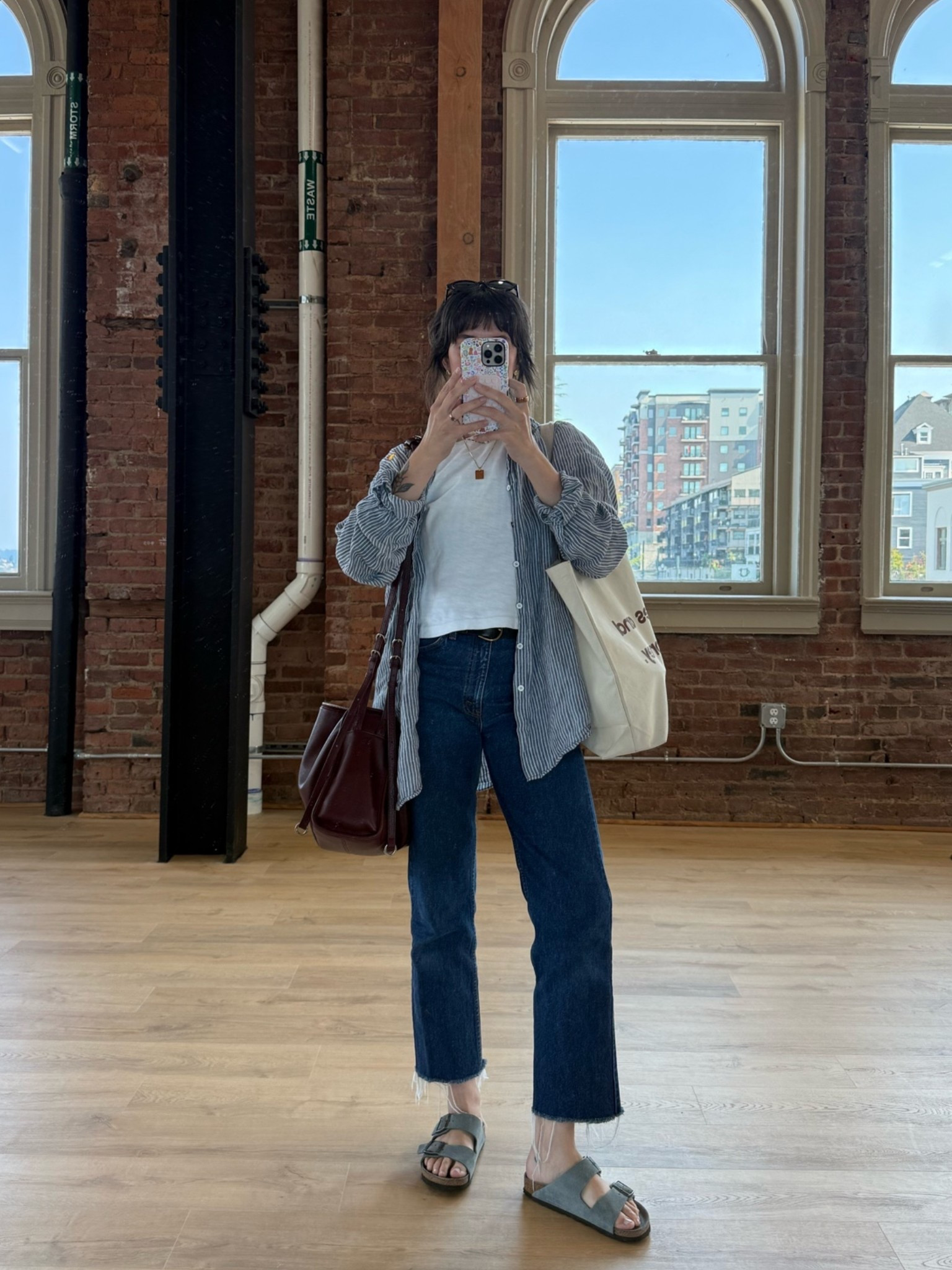 Aug 25 fit 🦋 jeans are orange tab vintage Levi’s - 505! The hem was cut off when I got them. Tee is old, but I linked the closest version they currently sell. The striped button  is thrifted, and then embroidered - by salama vintage! Tagged on ig. Bag is late to work, KT10 is the code there.

#LTKdayinmylife #LTKootd
