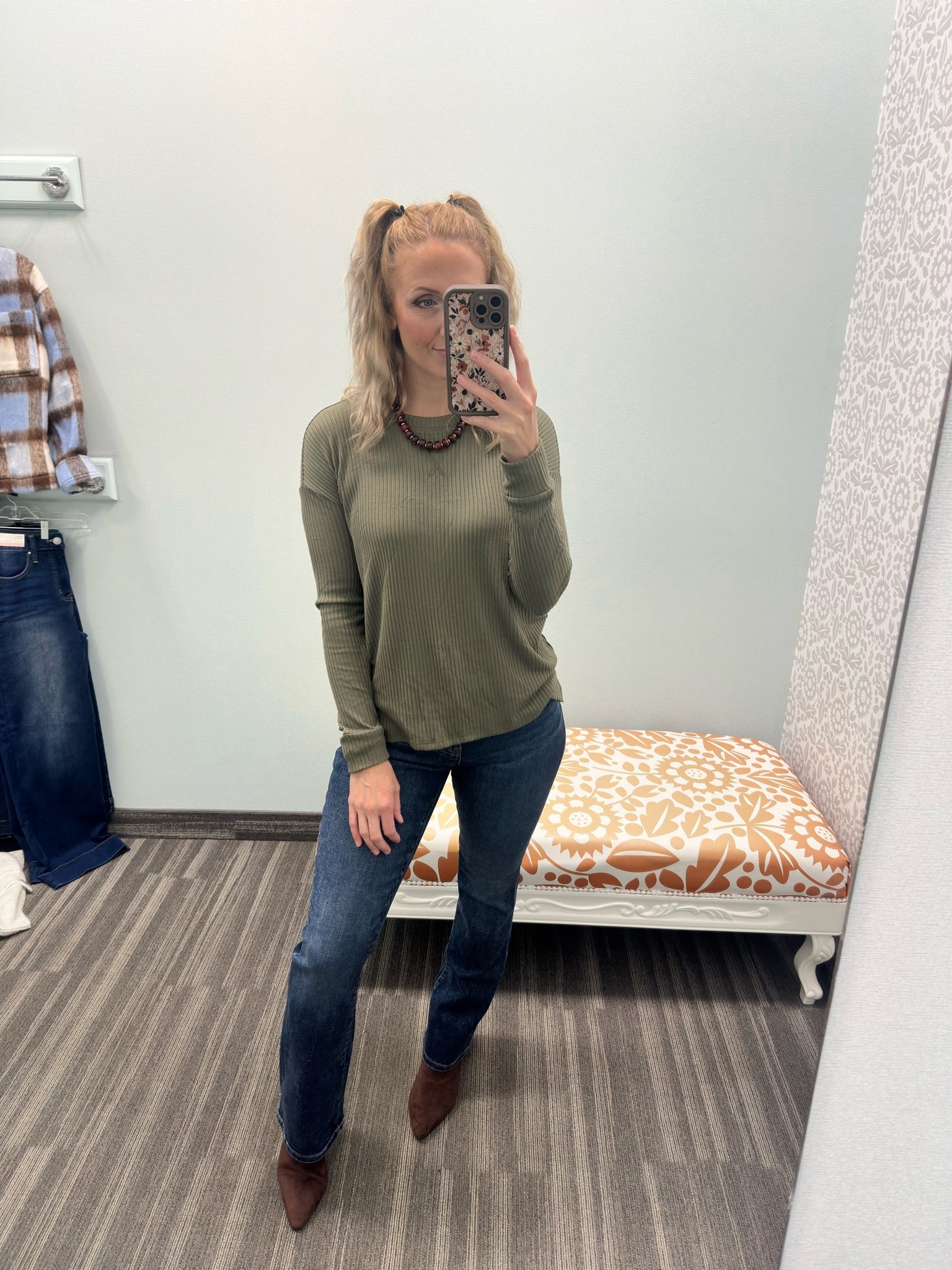 Wearing XSmall in top and 4 in jeans