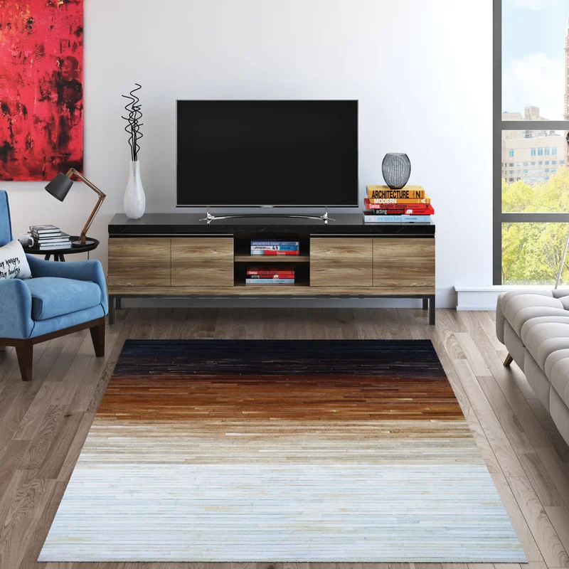 Ashlie Handmade Cowhide Black/Brown/Beige Rug | Wayfair North America