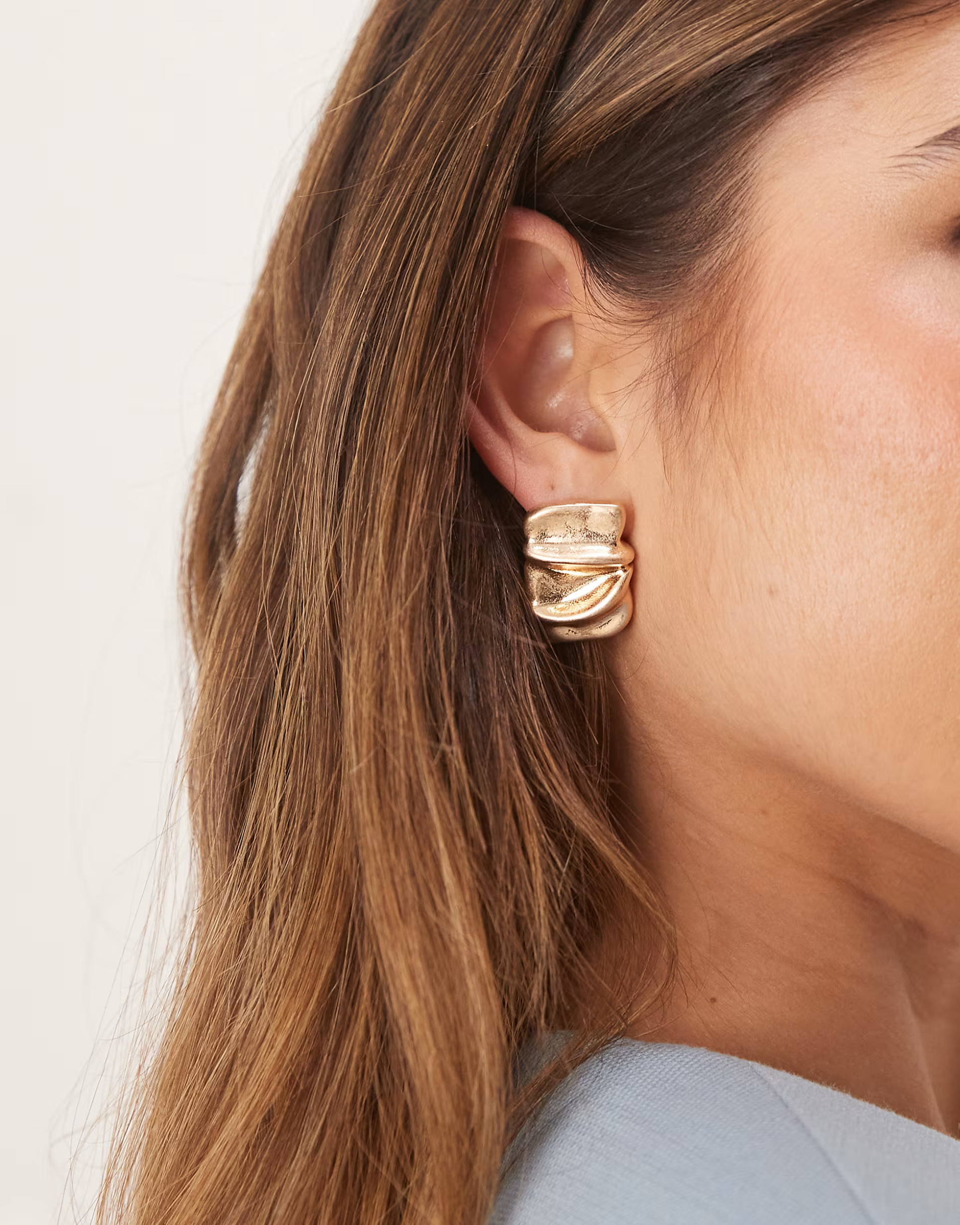 ASOS DESIGN stud earrings in square shape with molten finish in worn gold tone | ASOS (Global)