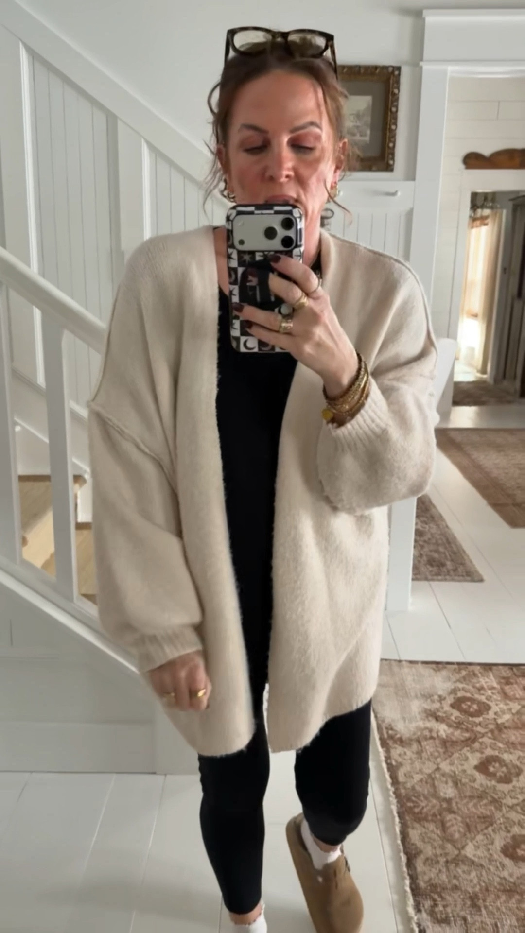 This is the perfect everyday outfit! It’s just a casual oversized t-shirt paired with my favorite leggings. I through a comfy sweater overtop for a cozy look. 

#LTKMidsize #LTKootd #LTKFindsUnder100