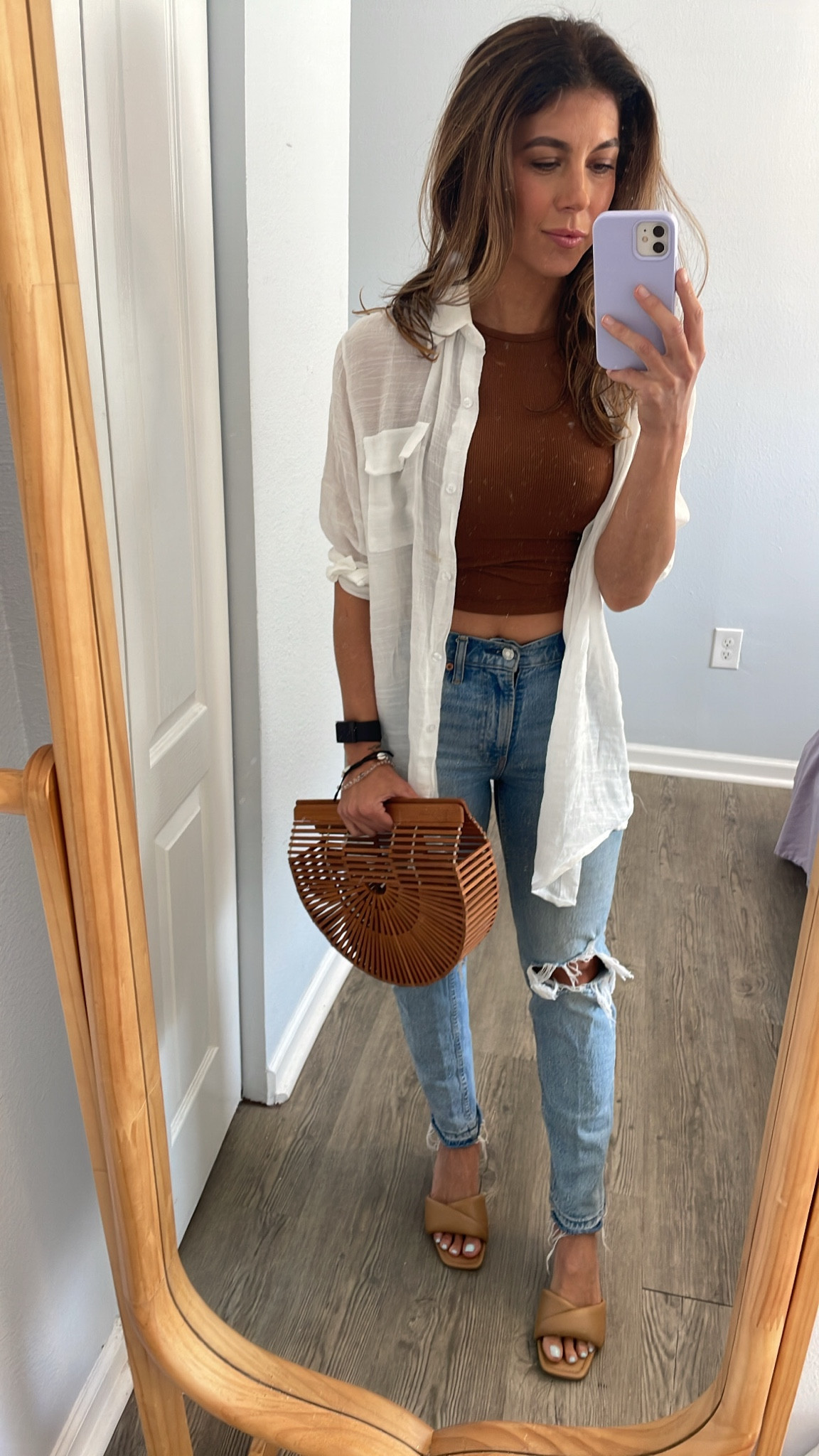 Cool, casual, chic at some great prices ✨🤌🏽🤩 Amazon gauzy button down has been a great versatile wardrobe piece. This warm cinnamon colored tank is so comfy and double lined for support going braless. Had to throw on my favorite straight cut gap jeans and my comfy tan mules 🤍

#LTKshoecrush #LTKstyletip #LTKSeasonal