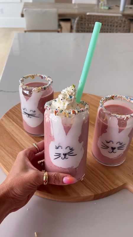 DIY Strawberry coconut  Bunny smoothie 🐰 

An easy fun DIY drink idea for spring or Easter! I used marshmallow fluff to make the bunnies and lined the rim with it too to get the sprinkles to stick. Draw a bunny face and add their favorite smoothie. (Also the sharpie washes off really easy. Warm water and a light scrub and it comes off so don’t worry you’re not ruining glasses 🥰) 

Kids Easter idea, Easter smoothie, fun Easter activity, kids Easter activity, kids smoothie, holiday smoothie, Walmart, Easter treat, Christine Andrew 

#LTKSeasonal #LTKkids #LTKfamily