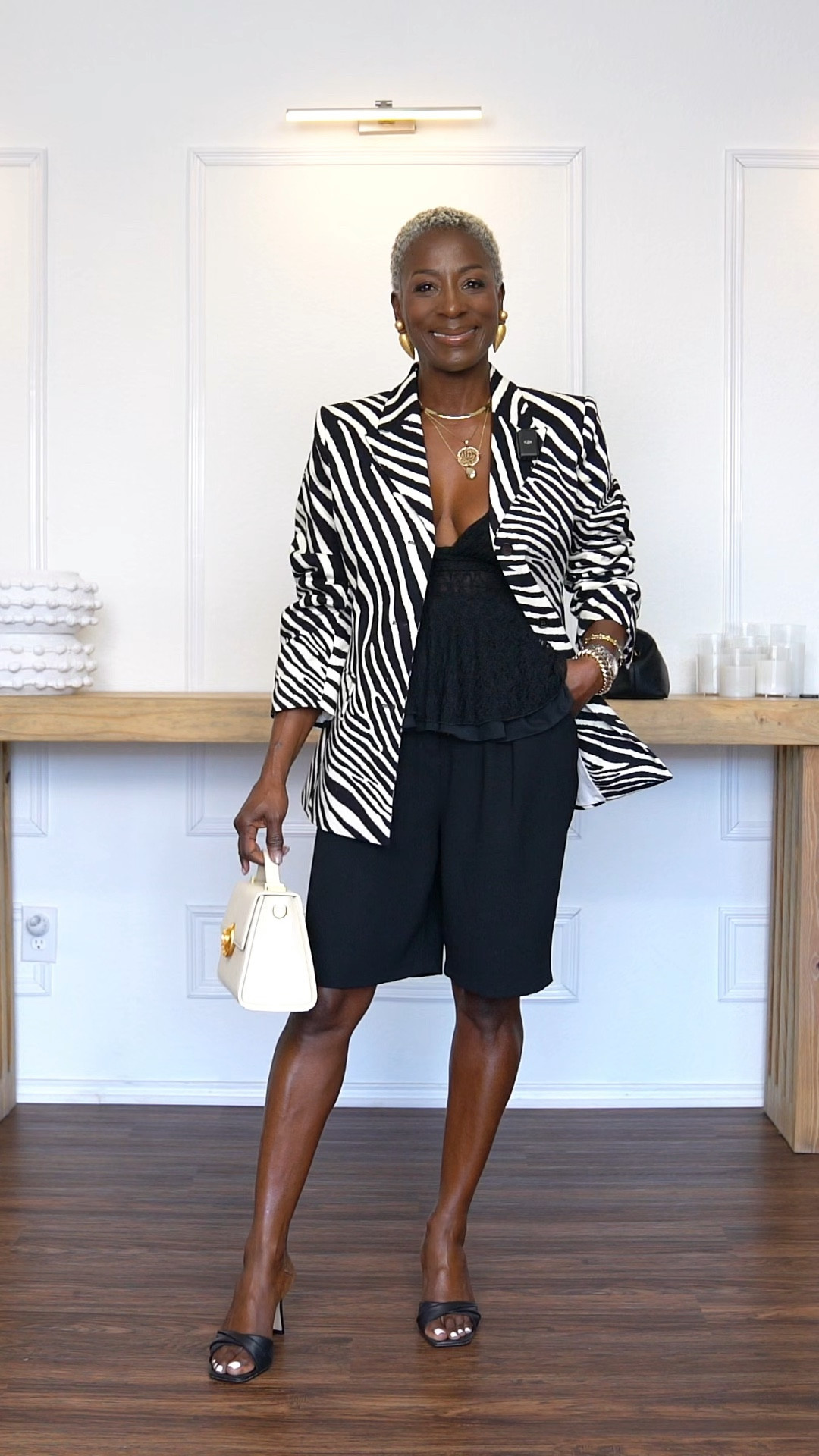 Zebra print blazer styled with this black shorts. Tap into it

#LTKootd