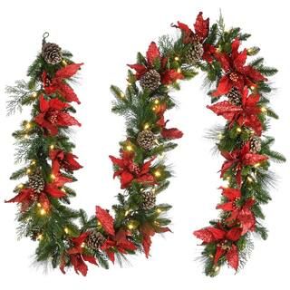 9 ft. Decorative Collection Feel Real Garland with Red Poinsettia, Gold Edged Cones, Flocked Ceda... | The Home Depot