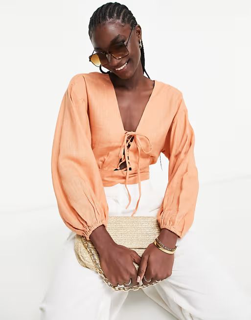 ASOS DESIGN linen top with lace-up front & volume sleeves in peach | ASOS (Global)