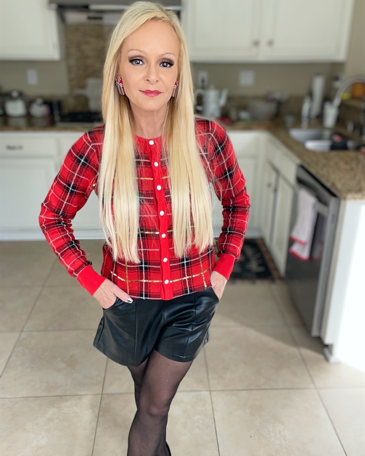 Cozy meets chic for the holidays 
🎁 This Christmas outfit is effortless but still gives that elegant wow factor — a classic plaid button-down cardigan, sleek leather shorts, and sheer black nylons for that timeless glam touch. Add your favorite heeled booties or tall boots, and you’re ready for anything from festive brunch to holiday cocktails.

I’ve linked similar cardigans, shorts, and accessories so you can recreate this polished look in minutes — it’s simple, stylish, and oh-so-holiday-ready. ❤️

🛍️ Shop the look below on my LTK!

#LTKHolidayStyle
#LTKWinterFashion
#LTKHolidayLooks
#LTKSeasonalStyle
#LTKChicStyle
#LTKCreator
#HouseOfPhyllisStyle



#LTKFindsUnder100 #LTKHoliday #LTKStyleTip