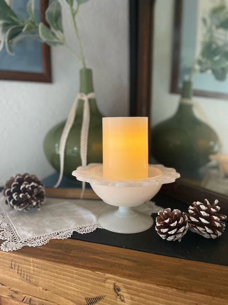I use faux pillar candles all around my house this time of year. The flickering flames help keep the drear away!

#LTKhome #LTKSeasonal #LTKfindsunder50