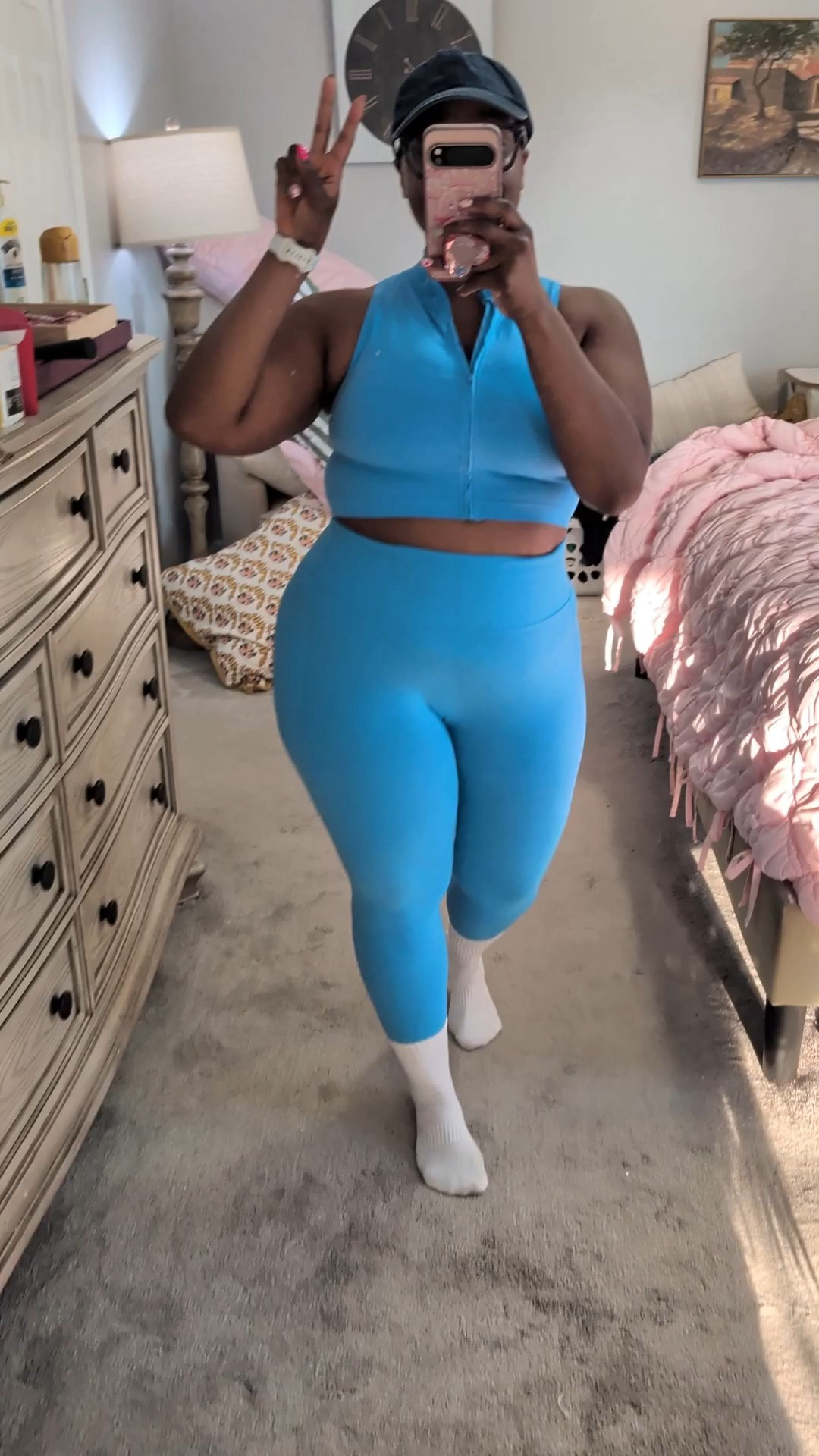 Yesterday's walking fit had us in a tizzy! But they have a few more in the color AND more sizes available in a cute corally pink!For reference, I'm wearing a large in the top and the bottoms and the matching sports bra underneath the top! 

#LTKActive #LTKMidsize #LTKgrwm