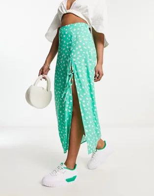 ASOS DESIGN bow detail midi skirt with thigh split in green ditsy floral | ASOS (Global)