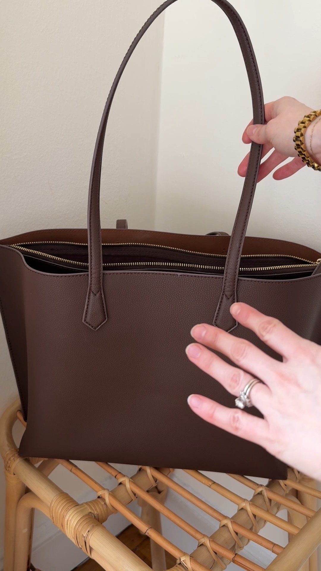 The leather work tote you love is BACK! Laptop pouch and several pockets. Finally back in chocolate brown plus free shipping @onequince

#LTKWorkwear