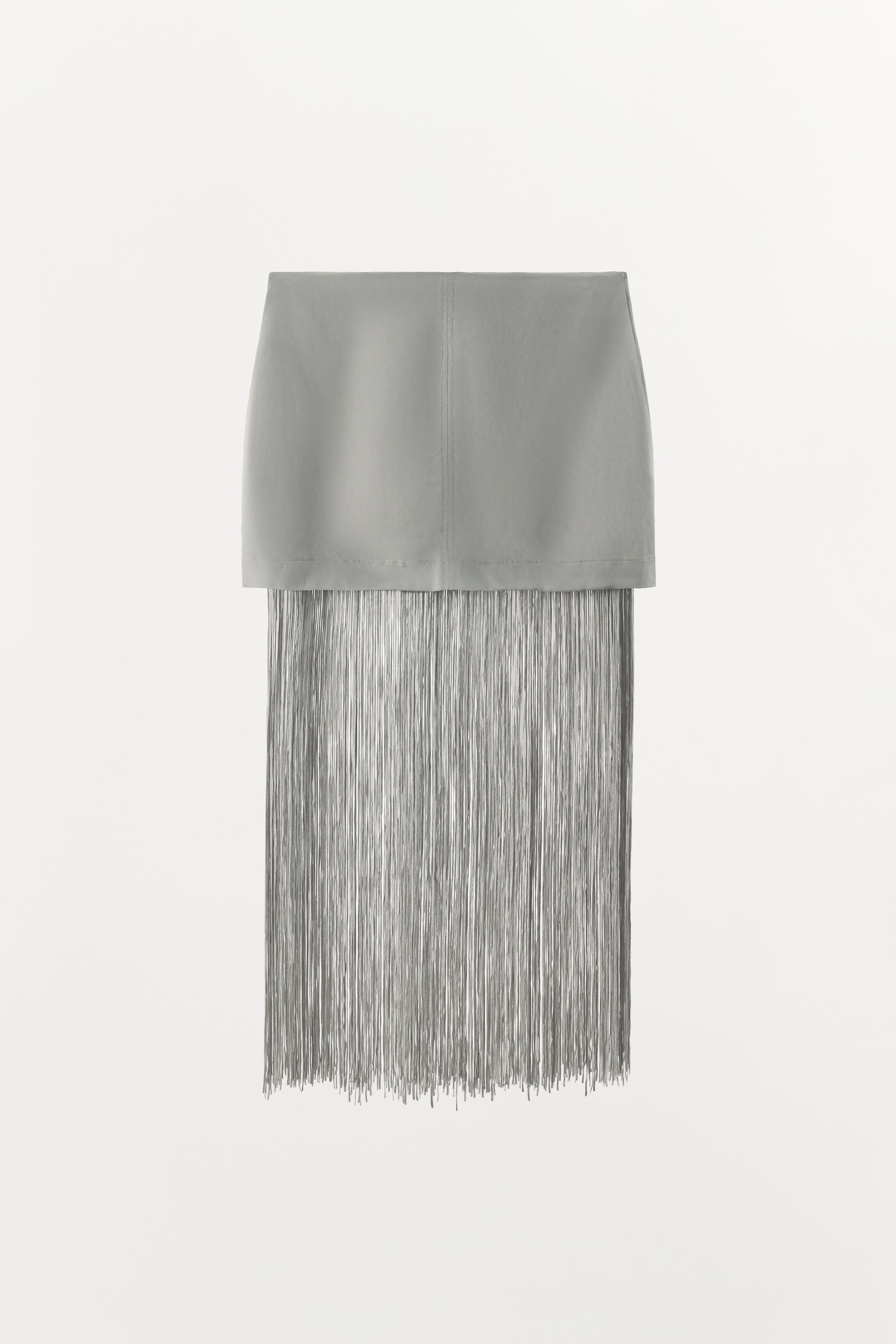 Low-rise mini skirt made in a viscose and linen blend. Hem finished with tonal fringe appliqu\u00... | Zara US