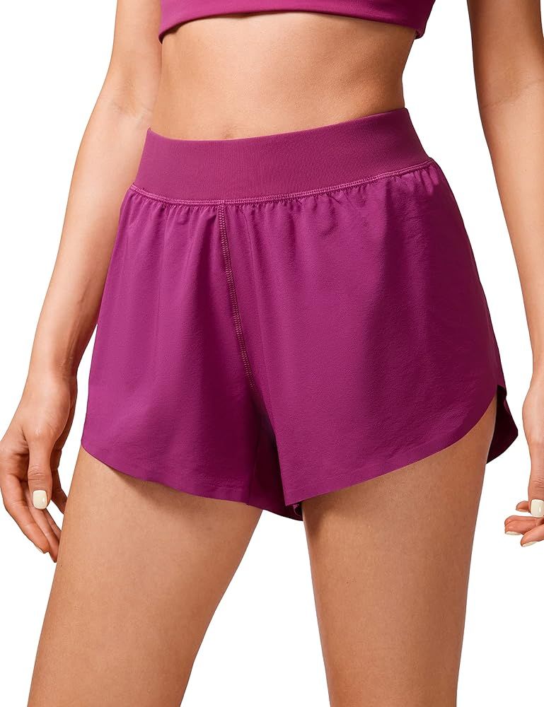 CRZ YOGA Mid Waisted Dolphin Running Shorts for Women, Quick Dry Lightweight Liner High Split Ath... | Amazon (US)