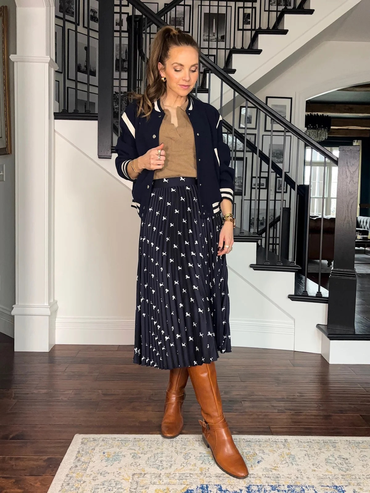 Bomber jacket styled with a sweater + pleated skirt 

#LTKStyleTip #LTKSeasonal #LTKWorkwear