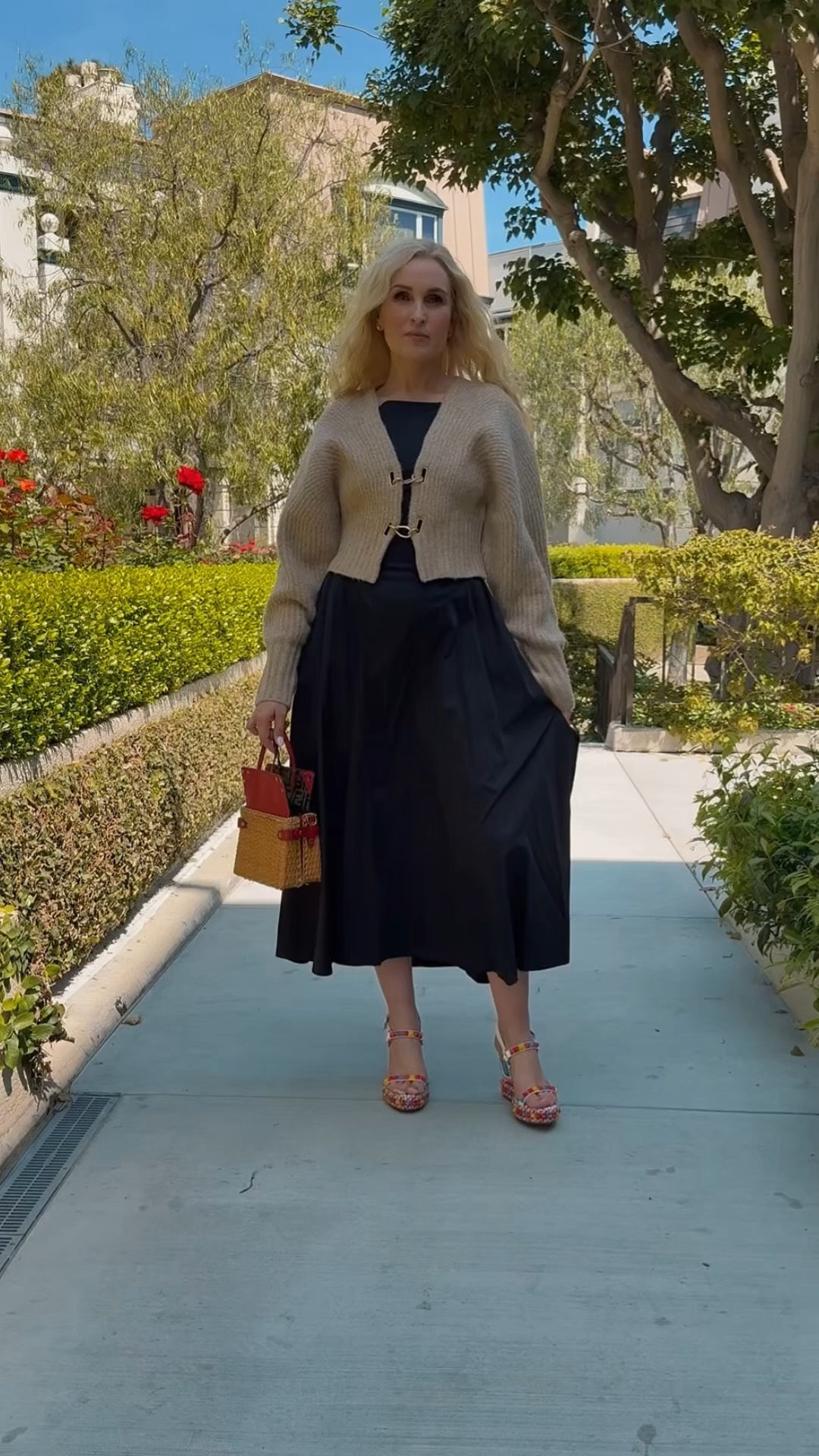 Little black dress styled with this fabulous @Revolve Cult Gaia cardigan ✨

#LTKMothersDay #LTKOver40 #LTKootd