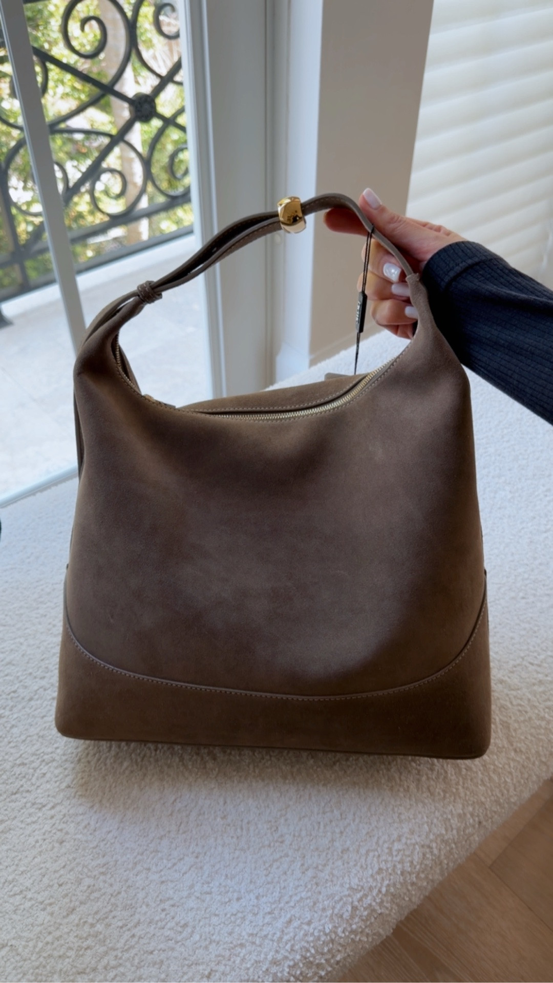 My newest suede bag 
Perfect staple for fall and winter, has a adjustable shoulder strap with metallic detail and zipper closure, spacious, and versatile.

#LTKU #LTKSeasonal #LTKCon