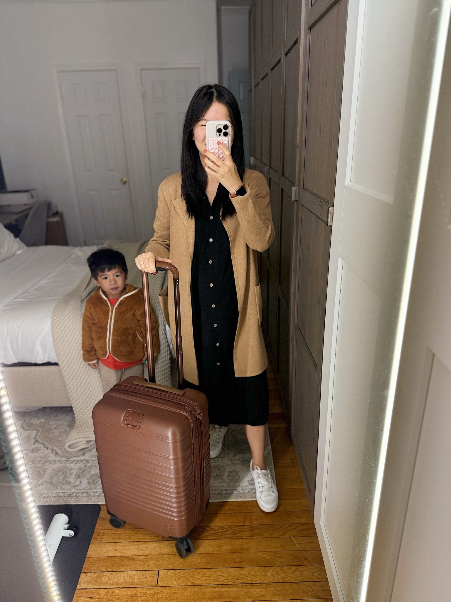 I.Crew sweater coat (XXS)
Black shirt dress (S)
Brown carryon suitcase
Beis carryon suitcase
White sneakers (TTS)
Toddler boy jacket
Toddler boy outfit
Amazon dress
Travel outfit

#LTKTravel #LTKFamily #LTKStyleTip