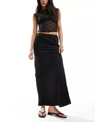 ASOS DESIGN satin bias maxi skirt in black | ASOS (Global)