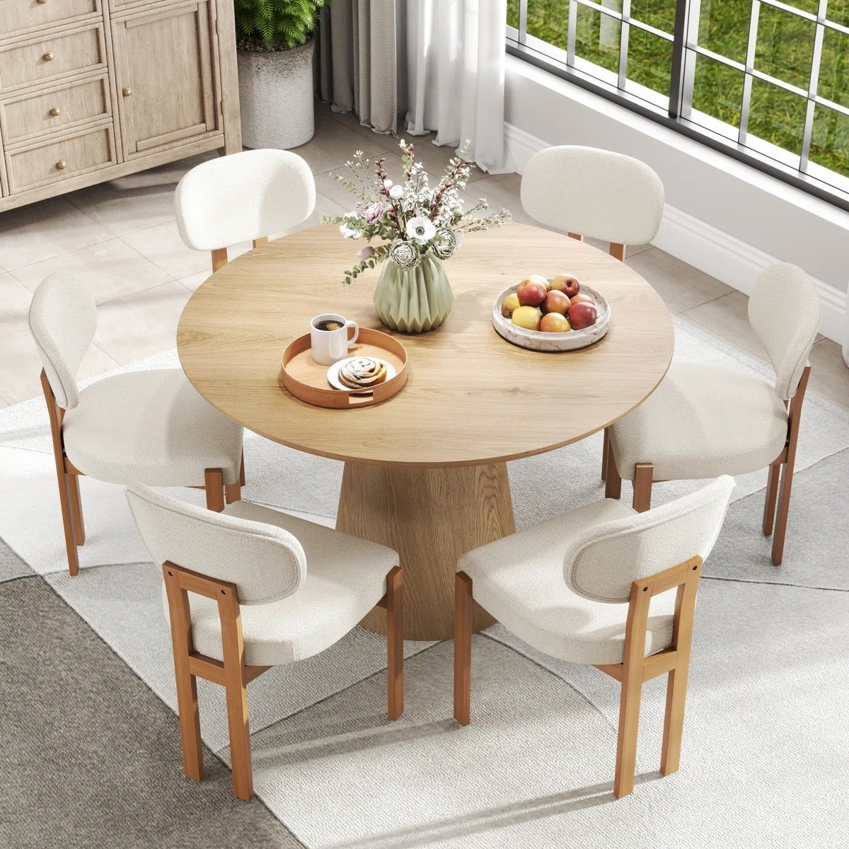 Designed with a classic pedestal silhouette and rich wood finish, this dining set brings mid-century charm into a refined, elevated everyday dining space. ON SALE and under $1,000.

Keywords:

* mid century dining set
* wooden pedestal table
* round dining table set
* modern dining furniture
* 4 person dining table
* mid century modern dining
* wooden dining set
* contemporary dining set
* mid century modern decor
* organic modern interiors
* warm wood furniture
* designer inspired dining room

#LTKSeasonal #LTKHome #LTKSaleAlert