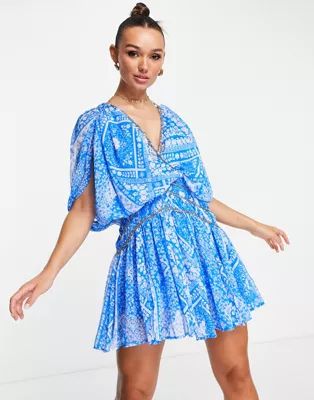 ASOS DESIGN blouson mini dress with chain strapping detail in blue floral | ASOS (Global)