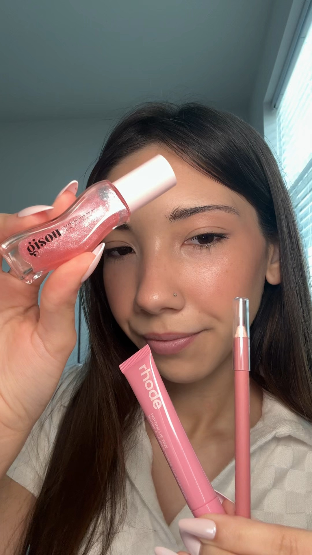 such a gorgeous pink lip combo 🎀💗✨ 
gisou lip oil 
tower28beauty lip liner
rhode skin peptide tint 

#LTKGiftGuide #LTKBeauty #LTKFindsUnder100