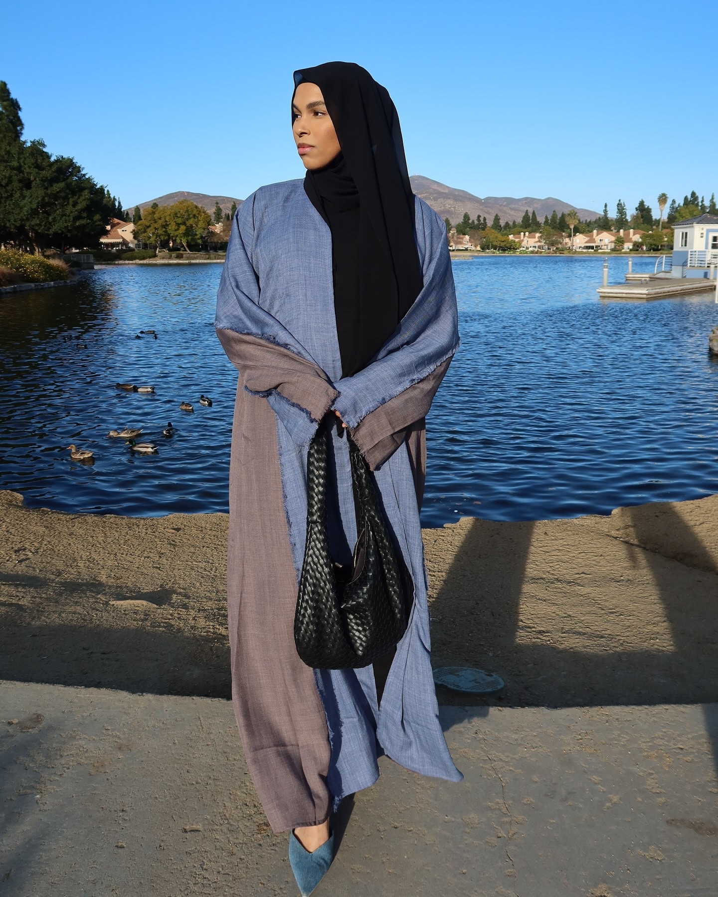 the dual tone denim abaya from @modest.essentials.usa is the perfect combination of elegant and timeless, use CODE ‘SPEAKPURE’ at checkout ✨🌊🦋🩵
•

•

•

#abayafashion #muslimah #hijabstyle #modestfashion #explore #hijabfashion #hijabinspiration #abayastyle #abayamodern