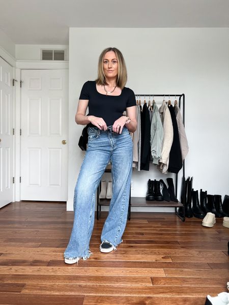 Jeans. Spring outfit. Spring outfit idea. Casual outfits. Casual outfit idea. T-shirt bodysuit. Wide leg jeans. Baggy jeans. Vans. Travel outfit. Mom outfit.

#LTKSeasonal #LTKfindsunder50 #LTKfindsunder100