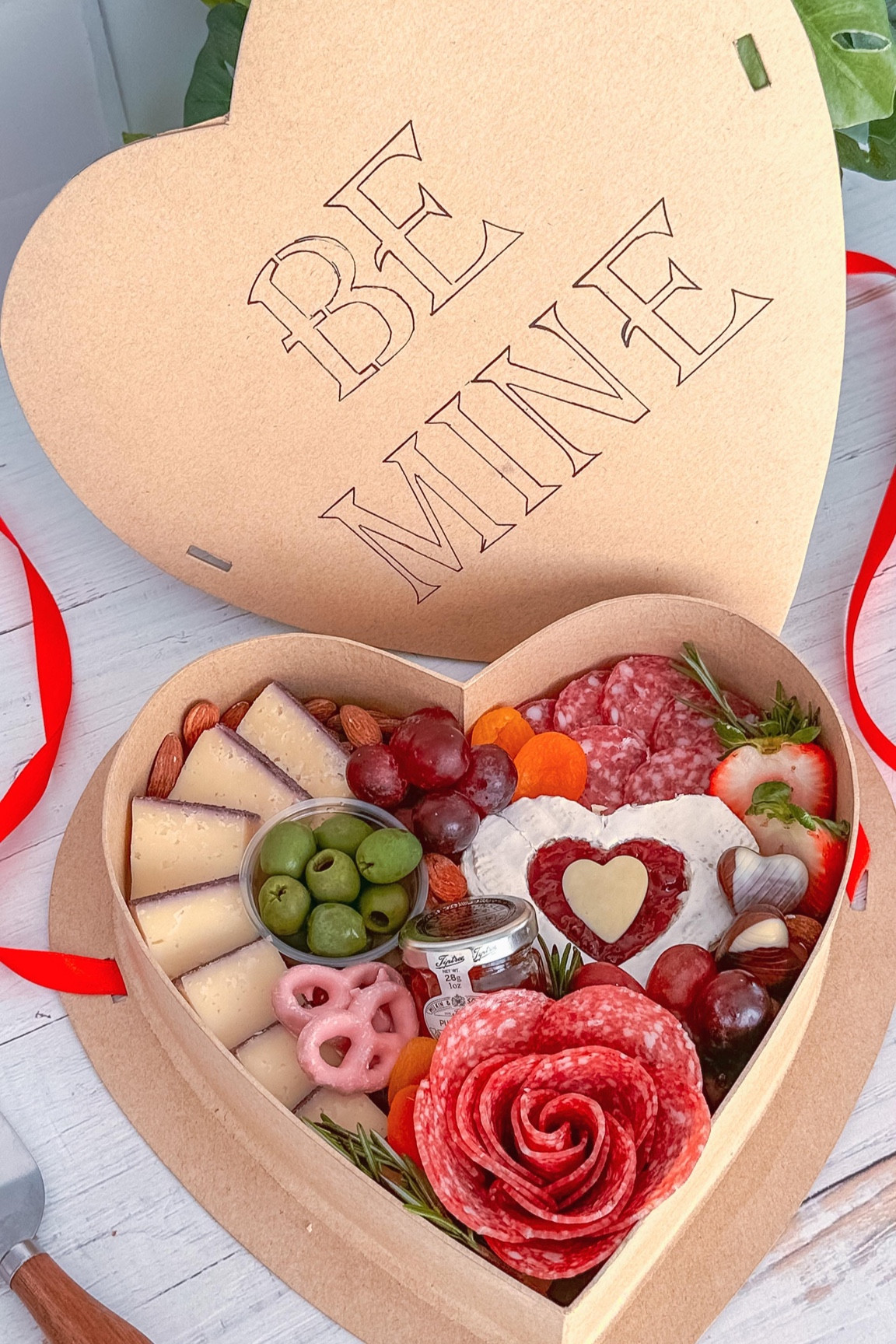 Who says Valentine’s gifts have to be sweet? 💕 Savory gifts can steal hearts too! 

Fill a heart-shaped box with cheeses, meats, crackers and, of course, still add that touch of chocolate!

#charcuterieandthings #valentineday #foodstyling #cheese #foodgifts #charcuterieboard