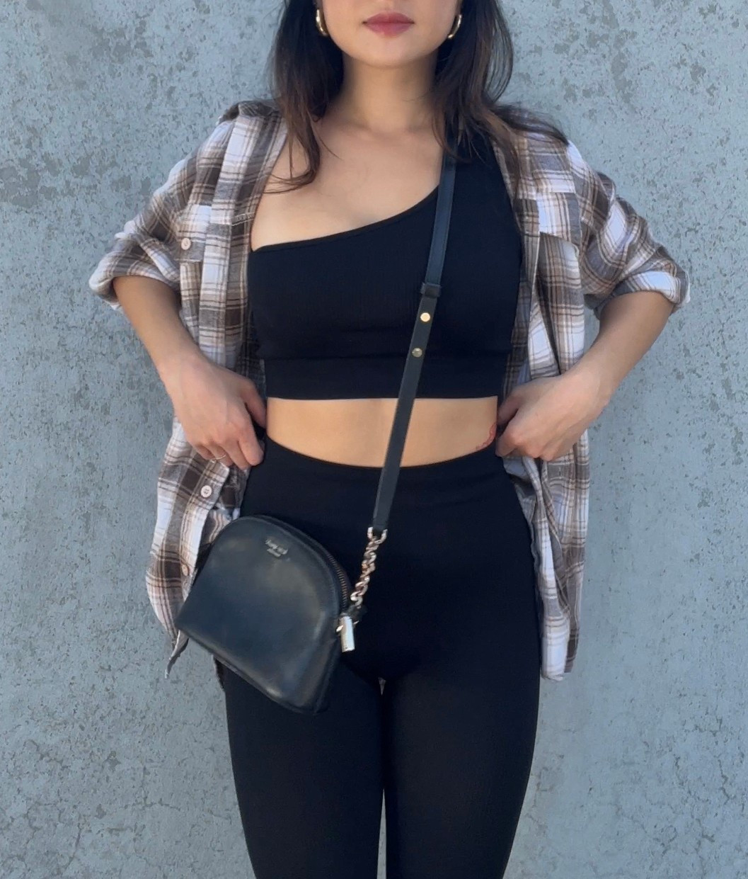 🖤 Street Style Meets Studio Style 🖤
Obsessed with this one-shoulder crop top + high-waisted legging combo—super flattering, supportive, and perfect for everything from coffee runs to casual hangs. Threw on a plaid shirt for that effortless layered vibe and added a mini crossbody to keep it hands-free + polished.

✨ Linked the exact outfit + budget-friendly dupes!
🛍 Shop the full look: #OneShoulderTop, #HighWaistedLeggings, #PlaidShacket, and #EverydayCrossbody

📌 #AthleisureStyle #CasualOutfit #FallTransitionalLook #LTKfit #LTKunder50 #WeekendVibes #OOTDstyle #ComfyChic

#LTKSummerEdit #LTKPetite #LTKStyleTip