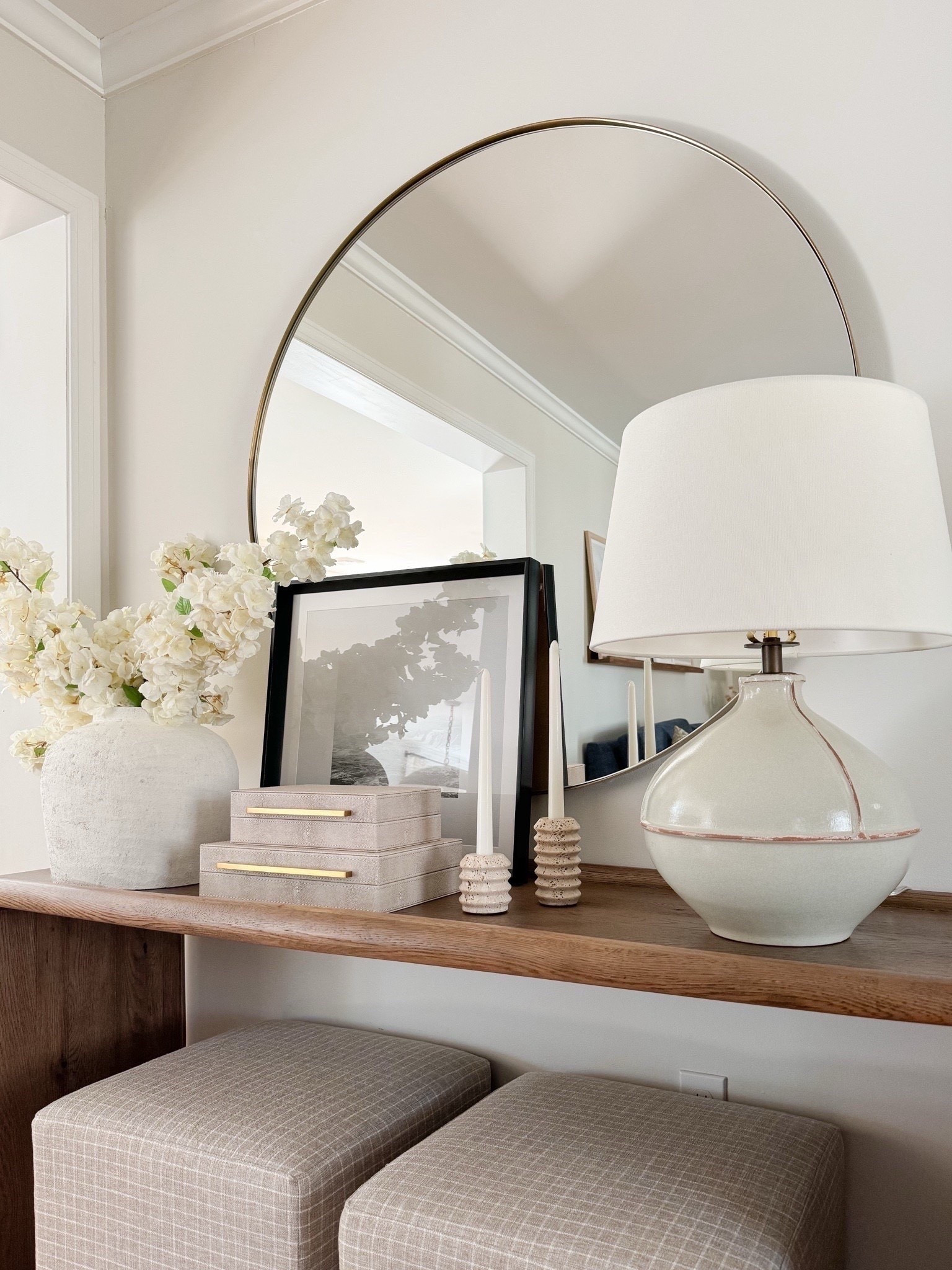 Lots of you are loving entryway decor ideas at the moment, and I’m with you! 🌼 There’s something that’s just so fun about swapping this decor out from season to season. From faux florals and vases to cozy table lamps, here’s some more inspo for your own space! Bonus: I found some great dupes at various price points for this mirror, the lamp, and the upholstered ottomans.

#LTKSaleAlert #LTKHome