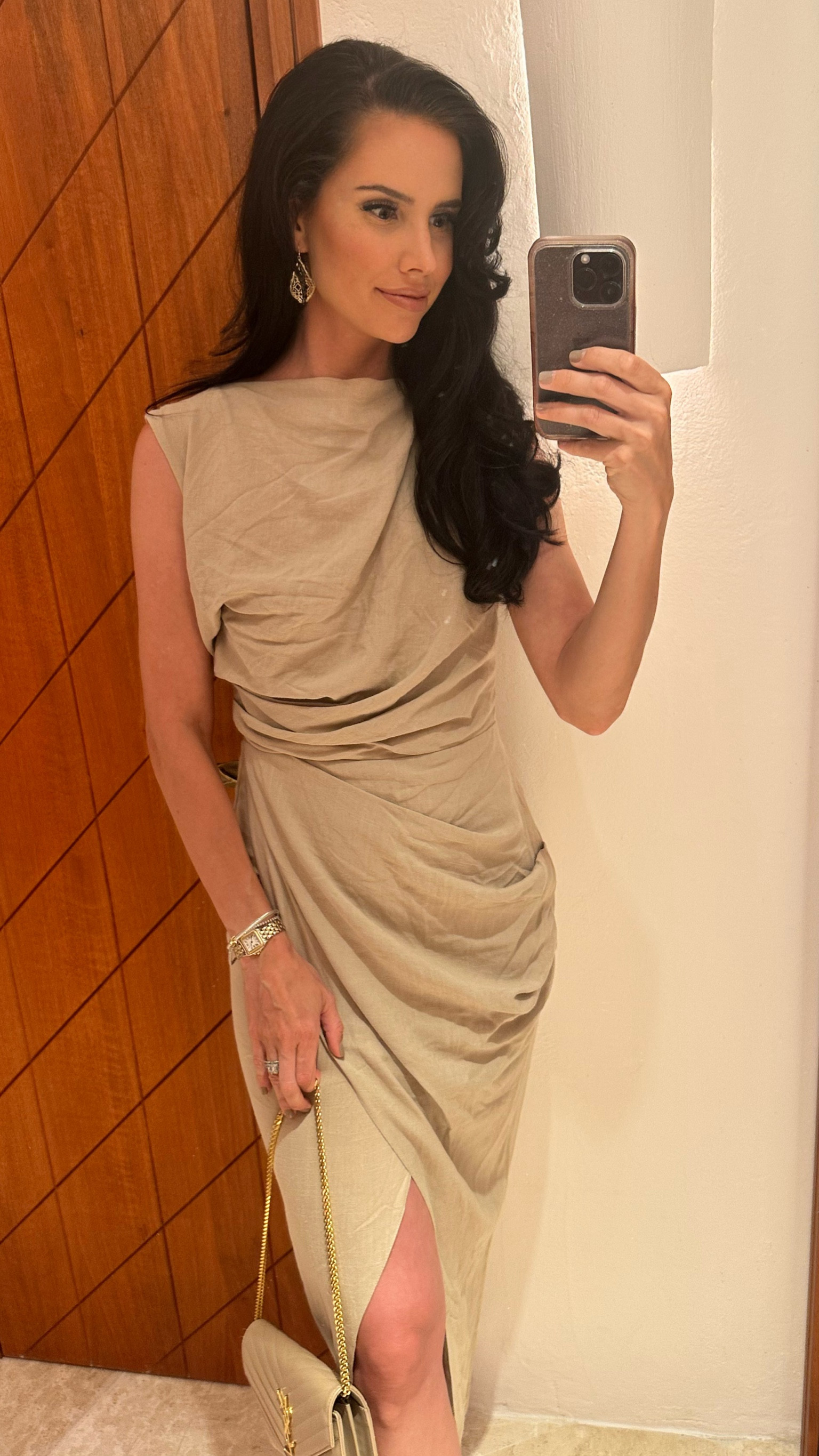 Tan linen drape midi dress for dinner in Sardinia, Italy. Wearing US size 4 from Asos, and it’s under $100. This hotel doesn’t have an iron or steamer so my suitcase did a number on it with the wrinkles. 

Vacation dress. Linen dress. Midi dress. Gold earrings. 

#LTKfindsunder100 #LTKeurope #LTKtravel