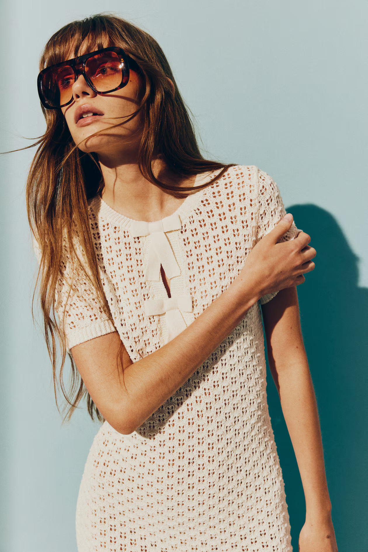 Bow-detail pointelle-knit dress | H&M (UK, MY, IN, SG, PH, TW, HK)