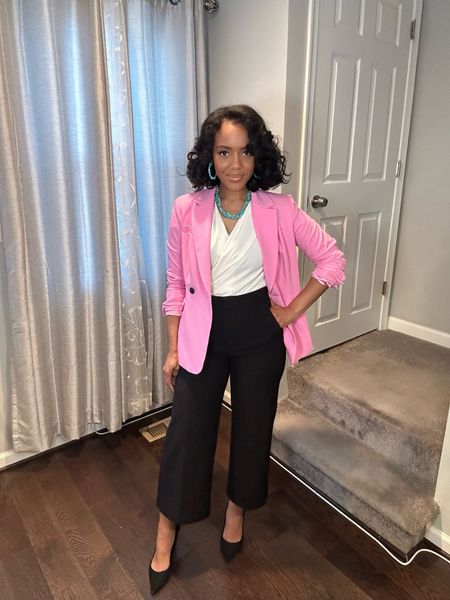 Create a vibrant and playful work outfit by pairing a pink blazer with turquoise accessories. Balance the bold colors with traditional  pieces like a white blouse and black slacks. 



#LTKworkwear