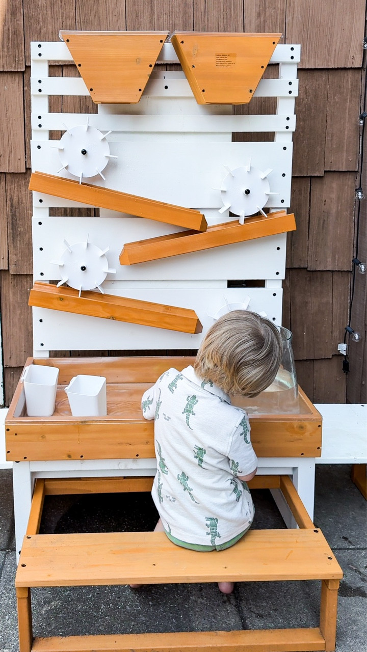 this wooden water table from @avenlurkids has been such a sweet addition to our slow summer rhythm. it’s not just beautiful—it’s functional, too: flowing water channels, spinning wheels, and a sensory-friendly design that supports real learning and independent play.
⁠
i love that it’s eco-friendly, thoughtfully made, and doesn’t scream “kid toy” in the middle of our earthy home. plus, it doubles as an activity or snack table and works indoors or outside—perfect for long summer days with little ones.

this season, we’re choosing play that feels like a love letter to childhood—simple, slow, and full of wonder 🌿

write “WATER TABLE” and i’ll send the link right to your inbox 💌
#hyggeparenting #slowmotherhood #intentionalparenting #montessoritoddler #sensoryplayideas #cozyminimalism #waterplayfun #earthyinspired #consciousparenting #montessorifamily #kidsoutdoorplay #neutralplayroom #motherhoodinspo #cozyhomevibes #slowlivingmom #sustainableparenting #montessorikids #mindfulmotherhood #simplejoys

#LTKHome #LTKFamily #LTKKids