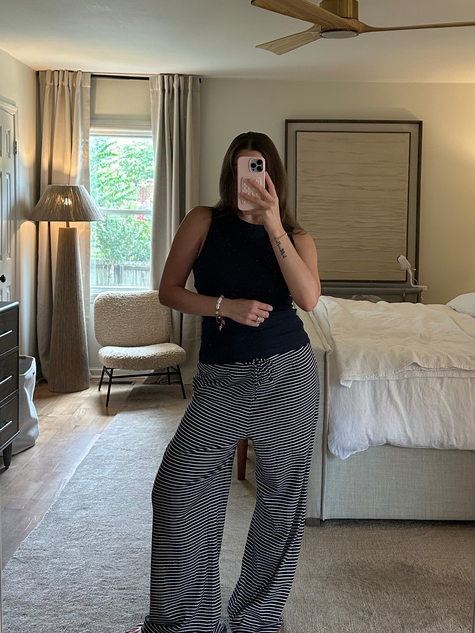 Comfy casual outfit of the day- loving this new navy ribbed tank and striped pants from H&M wearing a medium in both! 