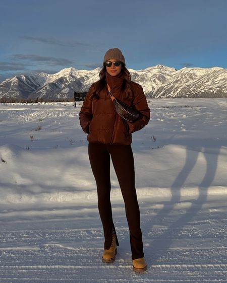 Chocolate brown winter outfit from Revolve - puffer jacket, Year Of Ours pant set, Celine boots, bottega sunglasses & Louis Vuitton bag 

Ski trip fashion, winter outfit inspiration 

#LTKFind #LTKstyletip #LTKSeasonal