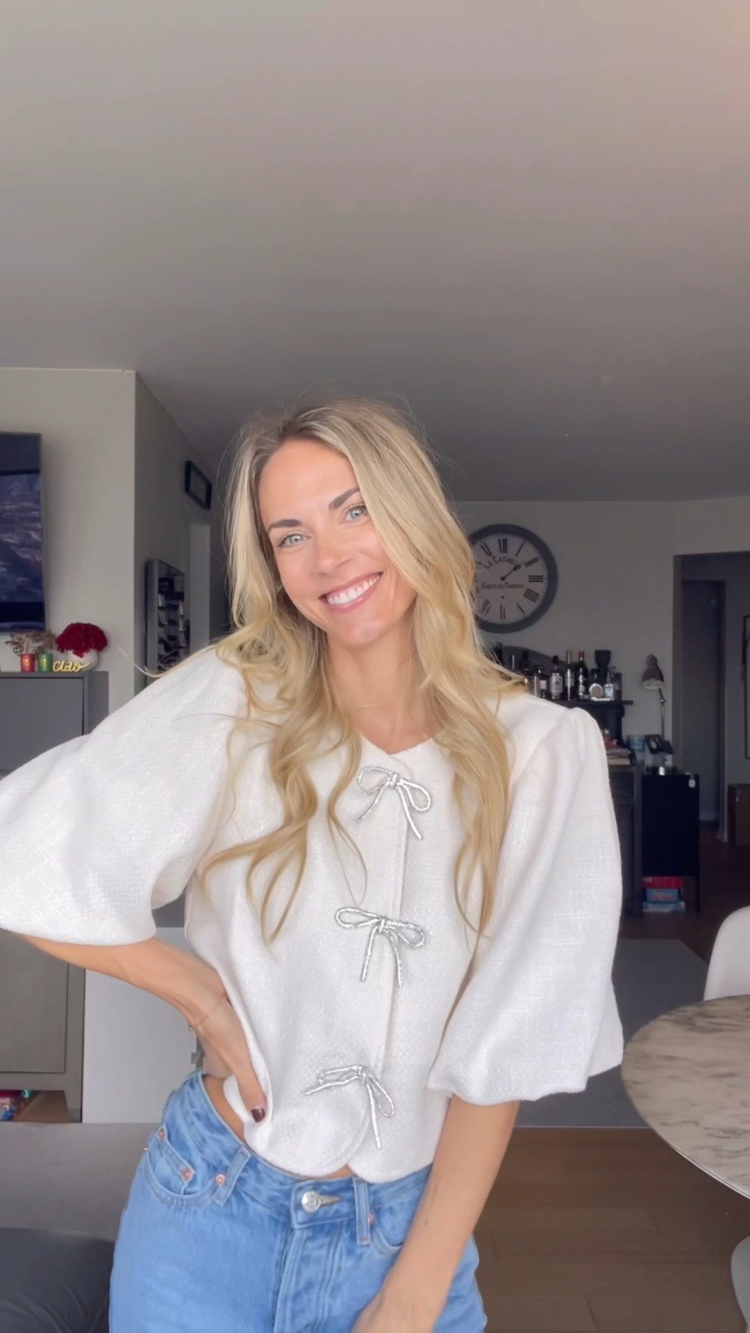 The perfect holiday top! 🎀 

The sparkly bows are the perfect touch on the top to wear to any upcoming holiday party. I paired it with jeans, but you could also throw on a silk skirt, or cream pants for a dressier look. 

I’m wearing a size XS. 

#LTKHoliday #LTKParties #LTKSeasonal