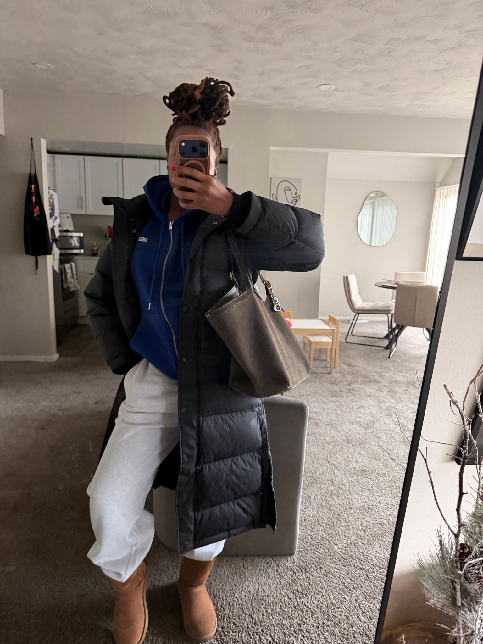 Cozy winter fit, OOTD.
Long puffer, hoodie, sweat pants, uggs - BAM. 

#LTKSeasonal #LTKootd