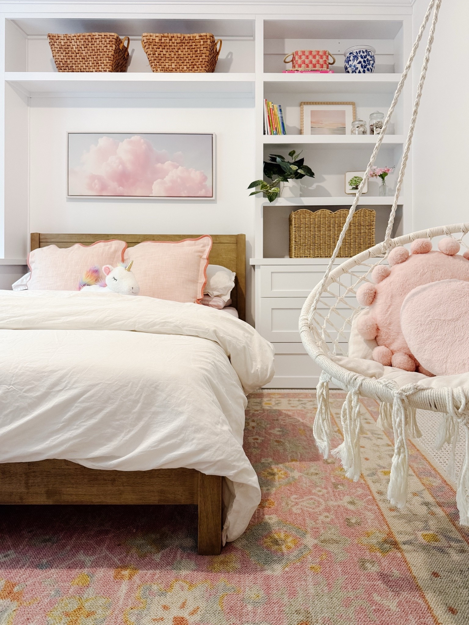 My nieces cloud inspired room! She said she wanted a room or she felt she was floating in the sky, and I think we nailed it. With the bedding, the art, the pink rug she loves the way it turned out.

#LTKHome #LTKSaleAlert #LTKKids