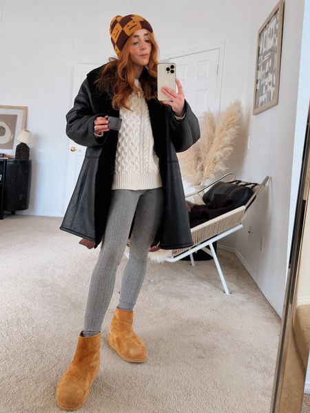 Cozy winter outfit in casual style can be both put together and sporty. Mix camel tones with darker grey and black leather for a playful take on winter minimalist style. Style Tip: shearling boots and shearling detail coats make for a cozy street style vibe.


#LTKstyletip #LTKshoecrush #LTKsalealert